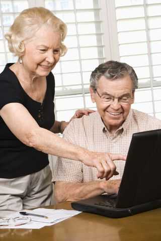 Senior couple at computer