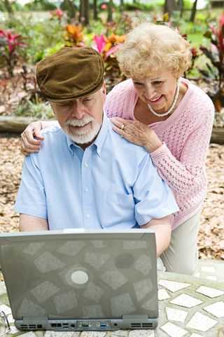 Old couple with computer