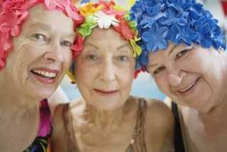Old ladies in swim caps